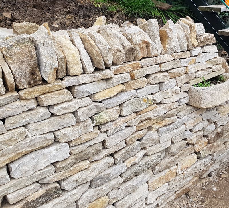 Retaining wall beside garden steps